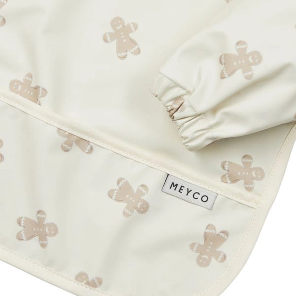 aermellaetzchen im lebkuchendesign für babys der marke meyco in der detailansicht