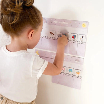 routineplaner für kinder nach montessori im regenbogen motiv mit kind in aktion